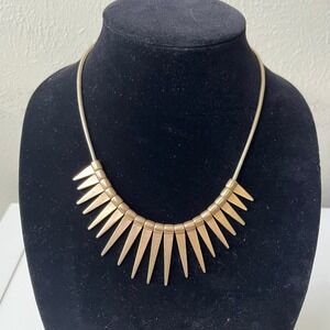 Gold tone spiky sun bib necklace